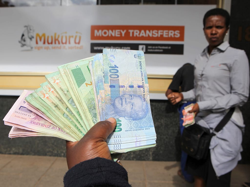 Rand Falls While Traders Await Key Decisions